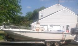 1989 Boston Whaler 22' Outrage with full enclosed transom and the factory Whaler Drive hull extension! This is a rare expensive option that extends the hull an additional 2.5' and provides an additional platform filled with flotation to support twin
