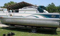 This pontoon boat is in great shape and ready for the water! Everything has been gone through and works as it should. It has a nice design and built with quality. The underside has an aluminum shield to protect the deck and add stability. -40 HP Yamaha
