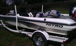 Motor 2 stroke 90 horse power Mercury, low hrs. ( 50 to 60 hrs ) Length is 17' 6". Boat, motor, and trailer 2004 model.Boat was purchased from Nitro Manufacture in 2008. Trolly motor, pro- series 4300 motor guide 43 pounds foot thrust. Fish and department