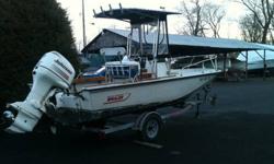 1985 Boston Whaler Outrage 18 Center Console w 2002 Johnson 150hp outboard, (less than 300hrs) ss prop. Includes galvanised trailer, t- top w/ electronics box/4 rod holdes front and rear spreader lights, leaning post w/4 rod holders, Lowrance 5'' color