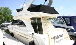 2003 Meridian 341 SEDAN BRIDGE This roomy two stateroom sedan cruiser is perfect for families needing separate accommodations for children or guests. Private enclosed head with separate stall shower. Large bridge with wrap around seating and captain?s