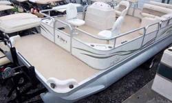I have a 2005 Triton Summit 220 Gold pontoon boat for sale. It is 22' long and has a 50hp Johnson on it. It has a vinyl floor and 2 pedestal seats up front. I have a new bimini top ordered for it. This boat is in great condition and comes with a Hustler