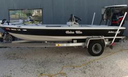 1720 Special Edition Flyfisher, 125hp Mercury 2-stroke, hydraulic trim tabs and power pole, trolling motor Minnkota 24v 70lbs thrust, polling platform, battery charger onboard, 2 livewells, power jack plate, aluminum Loadmaster trailer with spare