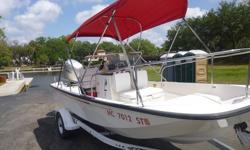 1998 Boston Whaler 17' Montauk. This boat was used only in fresh water. Cooler seat, front of console with double back rest, double custom Bimini with new sunbrella, X46 Lowrance, original Boston Whaler helm seat, bow rails, and slide rails. Lifting eyes