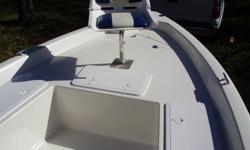 2006 NauticStar 2100 Nautic Bay. Center Console, rear live well and console bait well. Console has large storage compartment. Six rod holders in the console and two gunnel rod holders, also has rod locker in front compartment. GPS/Fish/Depth finder. 24v