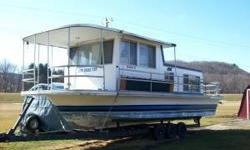 Nice getaway toy and a must see. This is a 30' long houseboat that was repowered in 2007 and runs great. We have also put new interior on the inside. We are asking $15,000 or best offer. Please contact by email at (click to respond) or by phone at.