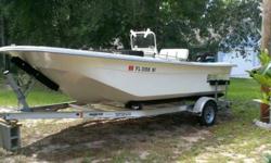 Carolina Skif 198DLV with center console, 90 hp Mercury Saltwater engine, bimini top, rod holders, live well, lots of storage, cooler helm seat, Hummingbird depth finder, compass, Magic Tilt trainer, very fuel efficient, great family boat for lake, river,