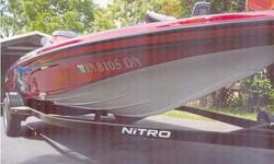 2006 NITRO 482 dual console, red metal flake w/some black & gray accents on side, color was custom picked out when the boat was ordered, (2) fish finders, Eagle320C color & Eagle Elite640C DF GPS, (2) batteries & a dual battery charger factory installed,