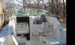2002 Wellcraft Coastal - 200 horsepower Bombardier Evinrude (fuel injected)For Sale - 24' wellcraft coastal cuddy. Fuel efficient 200 horsepower 2 stroke outboard. Low hours, deep vee, gps, fishfinder, vhs, stereo, galley, vaccu-flush, livewell, baitwell,