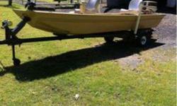 1436 polarkraft 18"sides heavy duty transum mod v new tan paint ready for ducks or fishing 2- seats motor guide trolling engine 1992 25 horsepower Johnson electric starter runs great trailor has new paint all lamps work new wench good tires chains and