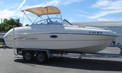 2002 Stingray 220 DS deckboat powered by a Volvo 5.7L sterndrive engine with ONLY 122 hours!!She features lots of room for the whole family including