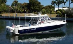 2004 Intrepid 37 EXPRESS Premium semi-custom sport boat delivering luxury and high octane performance with her triple outboard, 4-stroke power and stepped hull design.Exceptionally well equipped and ready for a variety of boating enjoyment.Beautiful blue