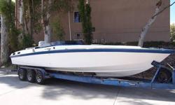 This is NOT a Wellcraft Scarab but 1 of 10 Kevlar 29 foot boats built by the founder of Scarab Larry Smith. This boat is powered by very fresh (15 hr) 350 CI professionally built Chevy small blocks with each doing a conservative 350 hp.This particular