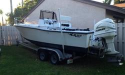 1983 Mako 22'6 Center Console with a 2000 225 Evinrude Ram Injection 2-Stroke Outboard. Comes with new Dual Batteries, Trim Tabs, Black Bimini Top, VHF, Hummingbird Depth/Fish Finder, Two Live Wells, 100 Gallon Fuel Tank, Canvas Cover, and Trailer that
