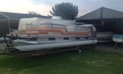 ,,,1984 Sun Tracker 24' Pontoon boat. She had been sitting outside in the Arizona hot desert sun and had deteriorated with age when I found her. The boat was stripped down and all new marine grade plywood was installed. Premium grade carpet was installed