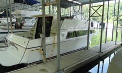 This is a fresh water, professionally maintained fly bridge cruiser in excellent condition. Twin Merc 5.7l engines with aprox 1050 hours, generator, heat and air, new vinyl, and interior dÃ©cor. Canvas is in excellent condition, hull recently waxed and