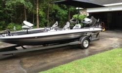 Super clean Stratos; completely restored. Has:200 Johnson with new Raker II stainless prop. Polished aluminum mounting hardware, Original equipment.Johnson trolling motor, restored. Original equipment.New Minn Kota outboard electric.New Kenwood stereo