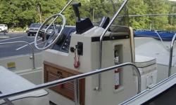 1991 Boston Whaler Montauk. I am the first owner. The boat has always been stored under cover. Never bottom painted. The interior is in excellent shape and does not show the normal stress/spider cracks as often seen in these boats. The hull does have some