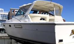 This Tiara 3100 Sport Fisherman Open is in very good condition and has been professionally maintained by its current owner who is a marine mechanic. The boat exterior features a swim platform w/telescoping ladder, walk-through transom w/latching door, a
