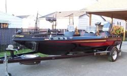 This is a 1993 champion 19ft bass boat, sitting on a ez -loader trailer. Boat is black, gold and red in color, has a 200 hp 2.5 liter mariner motor, Boat has a humming bird navagation system, depth finders, and fish finder. humming bird as.gr50 gps