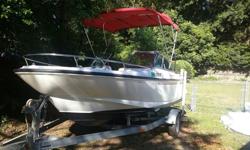 1995 Boston Whaler Unsinkable 17 DA D.C. for sale. Boat is powered by 1995 Evinrude 115 Oceanpro with 221 original hours. Engine was completely gone thru in 2014. Carbs rebuilt, new water pump,impeller, new mounts, plugs, new fuel pump, lower unit