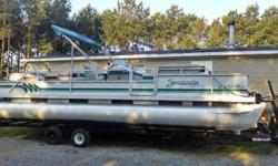 1995 Sweetwater (Godfrey Marine) 24 foot Pontoon boat. 90 hp Mercury motor with power trim (needs forward gear and carrier bearing in lower unit), trolling motor, fish finder, radio, double axle trailer, 2 new batteries, 2 live wells, sink, toilet,