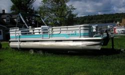 Just in a 1996 Weeres 24' Suntanner with a 75Hp Force motor. This boat has a bimini top with side curtains, individual seat covers, and a bow mounted swim ladder. This is a package that includes a tandem axle trailer. Motor recently serviced and ready to