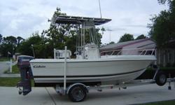 i have a 1997 cobia center console fishing boat , it is a 19.2 with a custom t-top, it features with extras,4 rocket launchers, t box and electronics box and gaff holders, it has two 40 gal. fish boxes up front in the bow section, it has an areated live