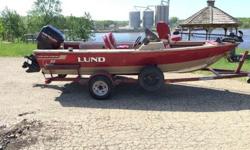 This is a 1997 Lund 1700 Pro Angler SS that is powered by a 1996 Mercury 90 2 Stroke. This boat is equipped with the following options: Lowrance HDS-5 GPS/Fishfinder at Bow, Lowrance LMS-522c GPS/Fishfinder at the console, Minn Kota 80 Terrova iPilot Bow