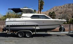 1999 Bayliner 2452 Siera Limited 24' cabin cruiser very good shape brand new motor 5.7 liter 300 horse mayby 5 hrs on motor under warrantee 2 years installed by Marine Center on Boulder Hwy runs great. fridge stove sink hot and cold water microwave ship