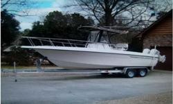 1999 Hydra-Sports Seahorse 230 CC, 1999 Hydra Sports 23 ft center console, good condition, console head compartment w/ porti potty, tons of storage, leaning post w/ rocket launchers & live well, transom rigging station w/ cutting board and sink, t-top,