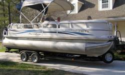 22' Fisher Deluxe Tritoon Pontoon Boat-(3)Triple Pontoons Front, Side & Rear Entry. Ski-tow Bar.Pop-up Changing Room. Rear Upholstered Sun Deck.2 Couches in ft./wrap-around couch in rear. Immaculate/no tears/no dings. Stored under cover next to home. Low