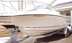 2002 21ft. Trophy Walk Around - 4.3 V6 Mercury I/O. This is a one owner fresh water boat that is in excellent condition with only 60hrs. VHF Radio, Fish Finder, Bimini Top, Porta Potti, Fresh Water Wash Down and trailer. $19,995.00