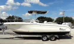 2005 Sea Chaser 2400 OFFSHORE 2005 Carolina Skiff Sea Chaser 2400 Offshore is a center console. Powered with twin Honda 150 motors with one gauge reading 352. Equipped with T-Top, bow rail, rocket launchers, bait well, anchor roller (no anchor), in floor