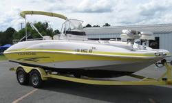 2005 Tahoe 215 Deck Boat powered by a 2005 Mercury 150 hp outboard engine with 355 hours. This deck boat is very spacious featuring (2) fishing chairs, bow seating, center console with (2) captains chairs, and back bench seating with walk thru to molded