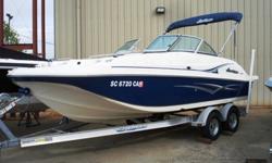 07 20 foot Hurricane Deck Boat loaded and in great condition. This fresh water only boat comes with a huge bimini top, full instrumentation including depth finder, front and rear boarding ladders, stereo, table, snap in carpet, docking lights, stainless