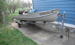 1954 Alumicraft 14ft. Fishing boat w/1993 Karavan Trailer(recently re-wired). 1997 Evinrude 6.0HP outboard motor w/5gal. tank used only one season. Minkota trolling motor. wooden oars, 2 anchors with new line. Marker bouys(never used), Fire extinguisher,