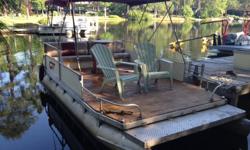 Beautiful pontoon with cedar floors, seats, and awning.Does not have a motor but easy to attach a gas or electric motor