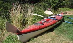 Fiberglass double sea kayak, Red color, 20 ft long, 26" wide, 75 lbs, with 2 high performance paddles and leashes, a bilge pump, a paddle float. Sail, mast, and lee-board available for another $340.