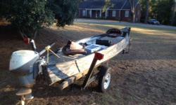 1993 Gheenoe Boat, motor, and trailer. 9.5 Evinrude. Removable plywood floor. 478-918-5304