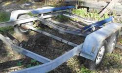 a nice galvanized tandem axel boat trailer. all lamps work and has surge brakes. had a 24 ft Sea Ray cutty inboard boat on it. Bow stop can be moved another 2 1/2 ft or so. Axels can also be moved. 740-802-8620Listing originally posted at http