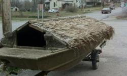 14' Lowe John boat with duck blind. Has welded bumper around it and t-rail on the inside. Asking 1500. Price is negotiable.