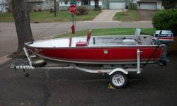 14FT Fishing boat with 25horse Envinrud with elctric start, 36lb Minkota trolling motor, Garmin fish/depth finder, Battery, Rod holders and 2 anchors Shorelander Trailer with forever license and spare tire, $1,800 or Best Offer Call Mike 651-436-2172