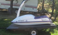 1992 Kawasaki 750 sx. upgrades include ride plate and finger throttle. Has a built in choke. Runs perfect. Comes with the trailer shown in the picture below. Trailer can hold two stand up jet skis. If interested call 906-869-0523.