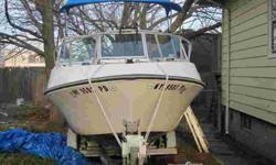 Runs Like a CLOCK must see GREAT BOAT went to the reefs 3 mis out.Only reason for sale is i bought a larger vessel.Engine is 120 horsepower evinrude motor i have to check think it is late 80's have to take more images.Cuddy cabin and Trailer.Boat is set