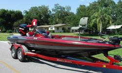 FRESH WATER RUNBOAT: (TJZ1P376J800) 2000 TRITON TR-21 20.6' BASS Boat. Color is Red/Black/Silver Metallic - Very Sharp looking! Extremely well built Bass Boat - Top of the Line. The boat is completely solid inside and out! All Compartment lids are in