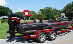 BOAT: (TJZ1P376J800) 2000 TRITON TR-21 20.6' BASS Boat. Color is Red/Black/Silver Metallic - Very Sharp looking! Extremely well built Bass Boat - Top of the Line. The boat is completely solid inside and out! All Compartment lids are in Excellent shape,