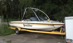 2001 MALIBU SPORTSTER LX Open Bow (seats 8), Yellow & White, with new 2007 V-6 Inboard Indmar Engine (less than 35 hours), bimini top, trailer and cover. Includes Perfect Pass cruise control, CD/Radio Stereo, Chrome Wakeboard tower with racks and tower