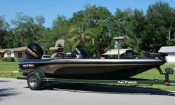 2001 NITRO NX 882 18' Bass Boat - Extremely well built Bass Boat. The boat is completely solid inside and out! All Compartment lids are in Great shape, Clean. Live Wells, Bilge, and all gauges work fine. Plenty of dry storage space. Motor Guide Trolling