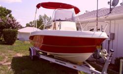 YOU ARE VIEWING A 2002 CARAVELLE CENTER CONSOLE FISHING BOAT WITH LOW. THE BOAT IS POWERED BY A 150 HORSEPOWER YAMAHA SALTWATER SERIES OUTBOARD WITH 202 HRS. THE ALUMINUM TRAILER WAS PURCHASED NEW IN 2006 AND IS EQUIPPED WITH DISC BRAKES AND HAS LESS THAN
